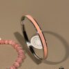 Cute Chrome Heart Cat's Eye Bracelet and Hermes Enamel Bangle