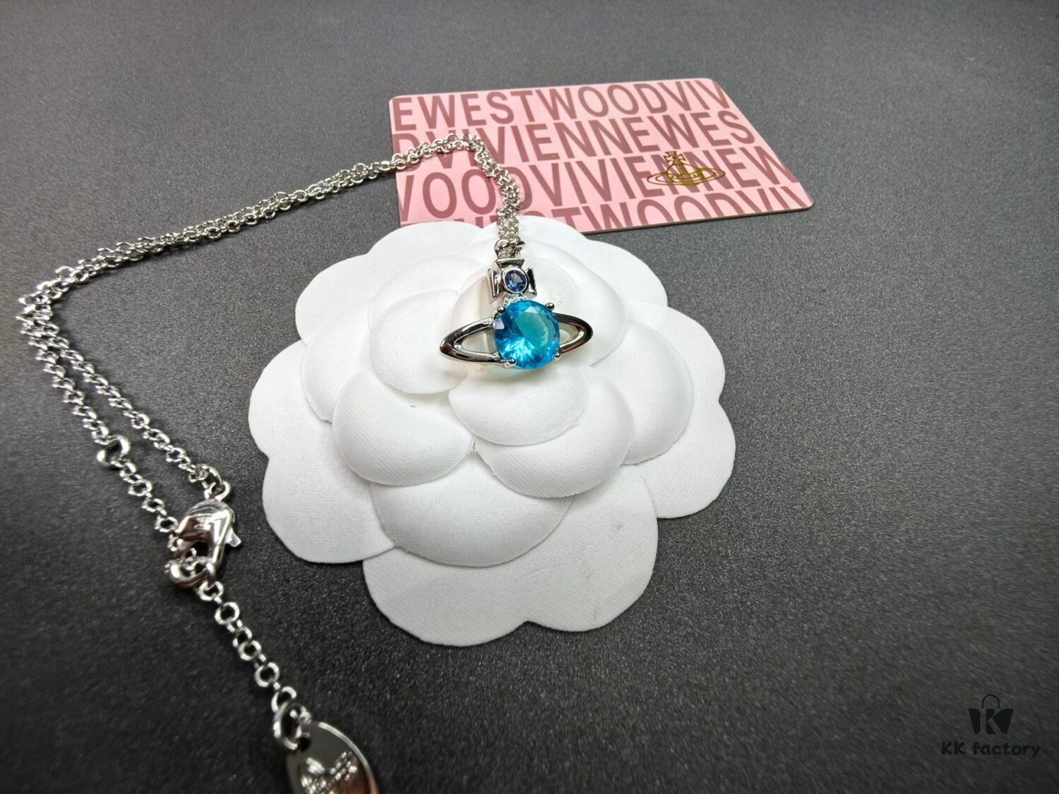 West Queen Single Diamond Blue, Brown, Green Necklace in Gold and White Gold with Blue Diamond