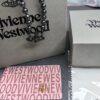 Vivienne Westwood Black Gun Color Saturn Pearl Necklace