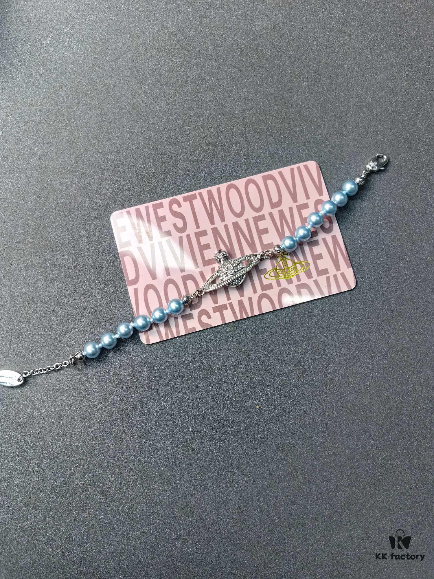 West Queen Light Blue Pearl Saturn Necklace and Bracelet