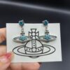 West Queen Saturn Earrings