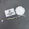 Vivienne Westwood Blue Enamel Saturn Brooch Set
