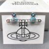 Vivienne Westwood Blue Enamel Saturn Brooch Set