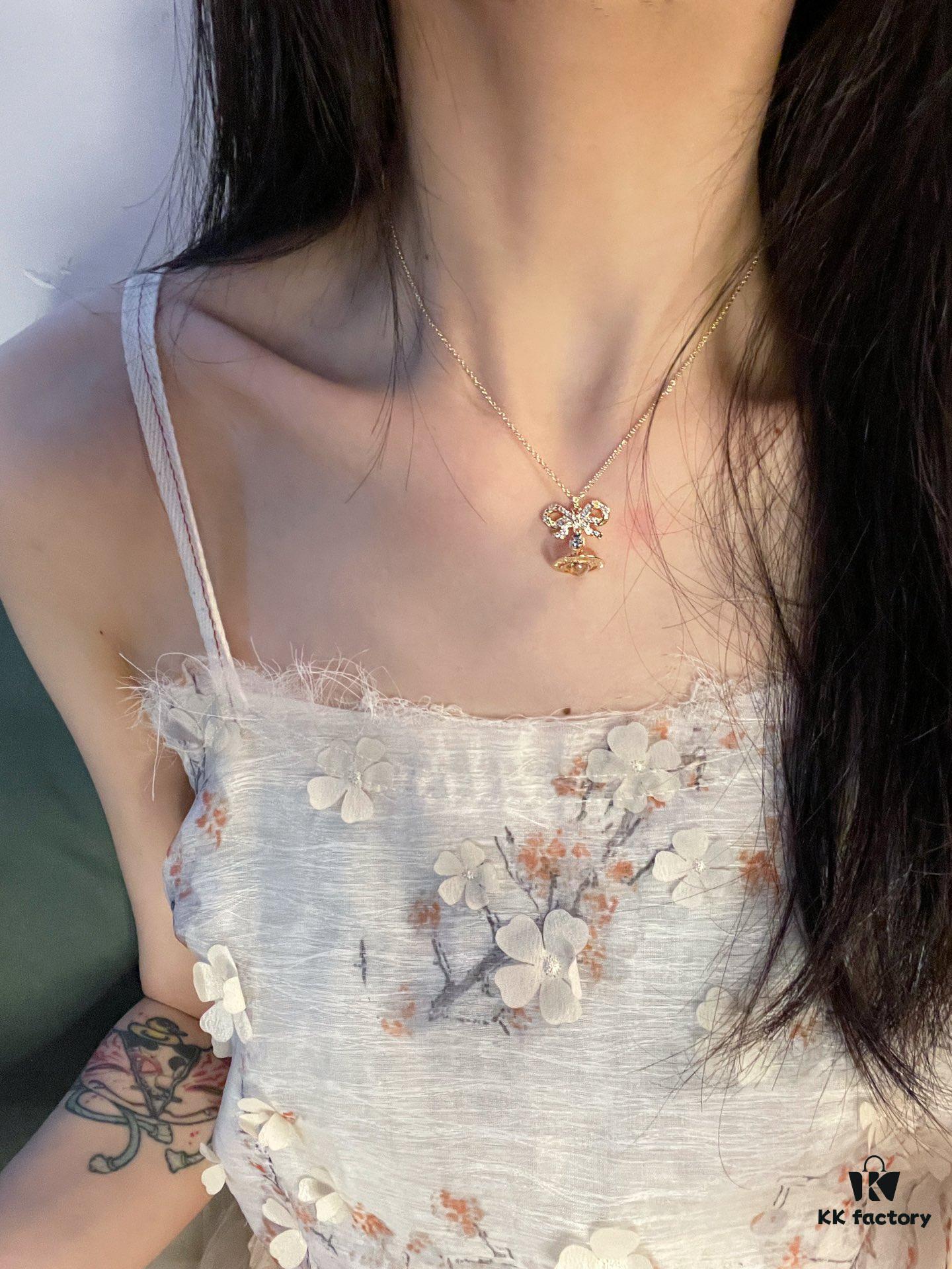 Westminster Saturn Octavie Bow Orb Planet Necklace