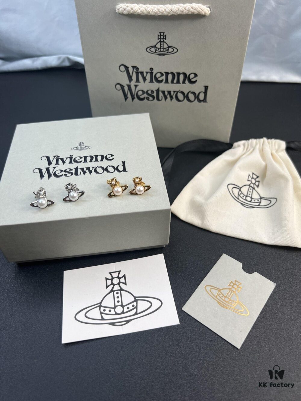 West Queen Half-Round Pearl Mini Saturn Stud Earrings