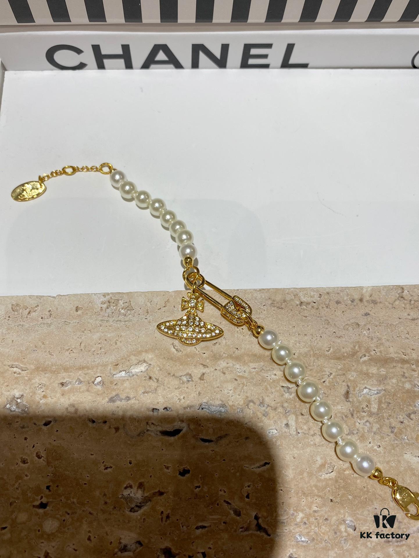 Saturn | Vivienne Westwood Jewelry - Brooch Style Pearl Necklace and Bracelet