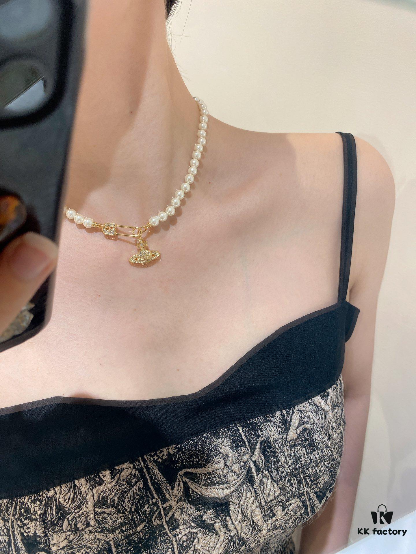 Saturn | Vivienne Westwood Jewelry - Brooch Style Pearl Necklace and Bracelet