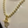 Vivienne Westwood Golden Saturn ORB Pearl Necklace