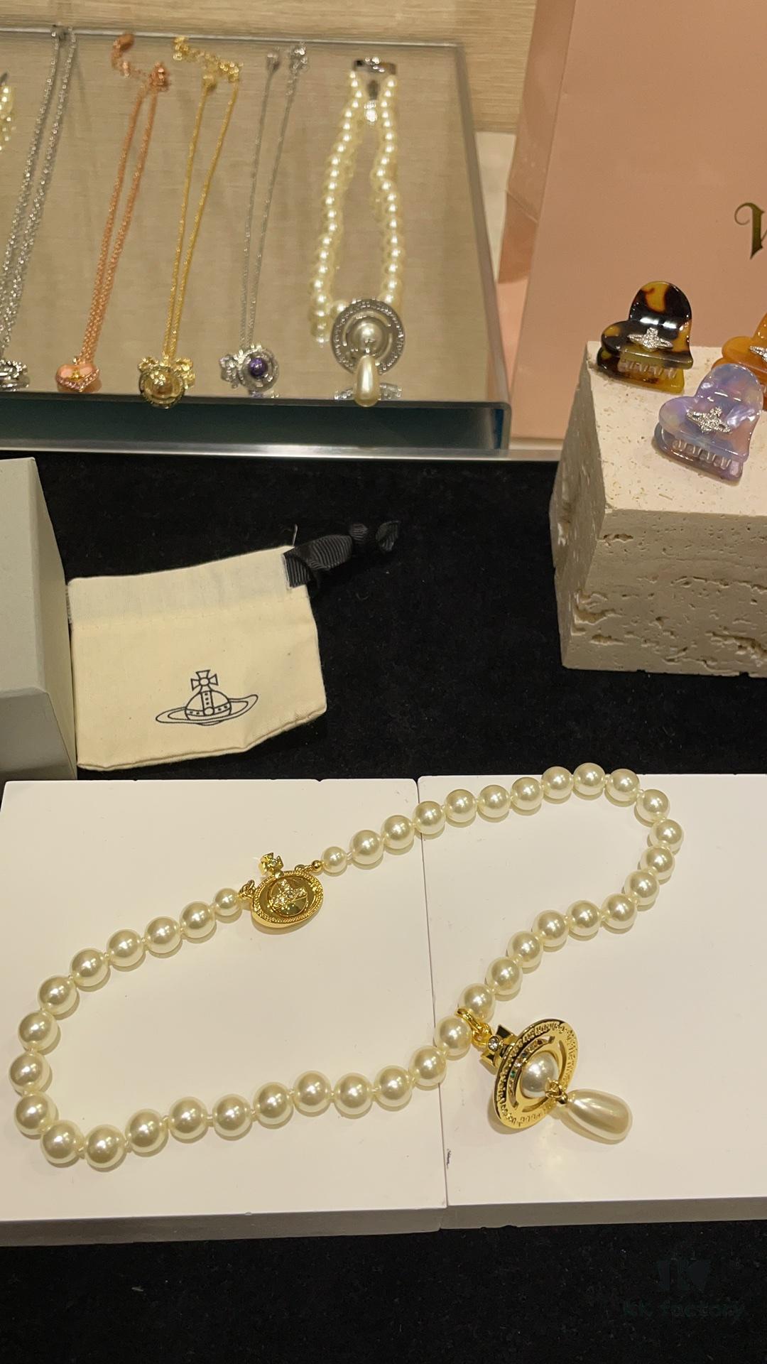 Vivienne Westwood Golden Saturn ORB Pearl Necklace