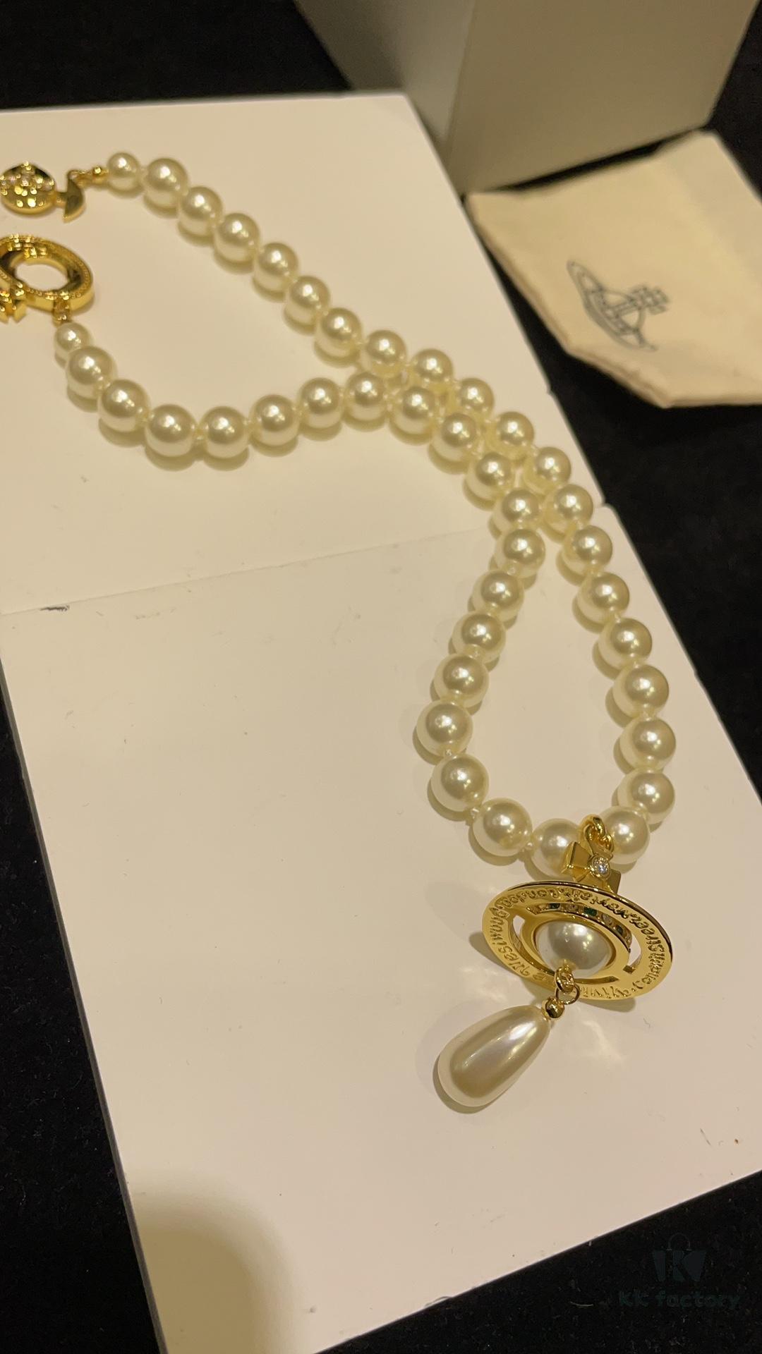 Vivienne Westwood Golden Saturn ORB Pearl Necklace