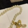 Vivienne Westwood Golden Saturn ORB Pearl Necklace