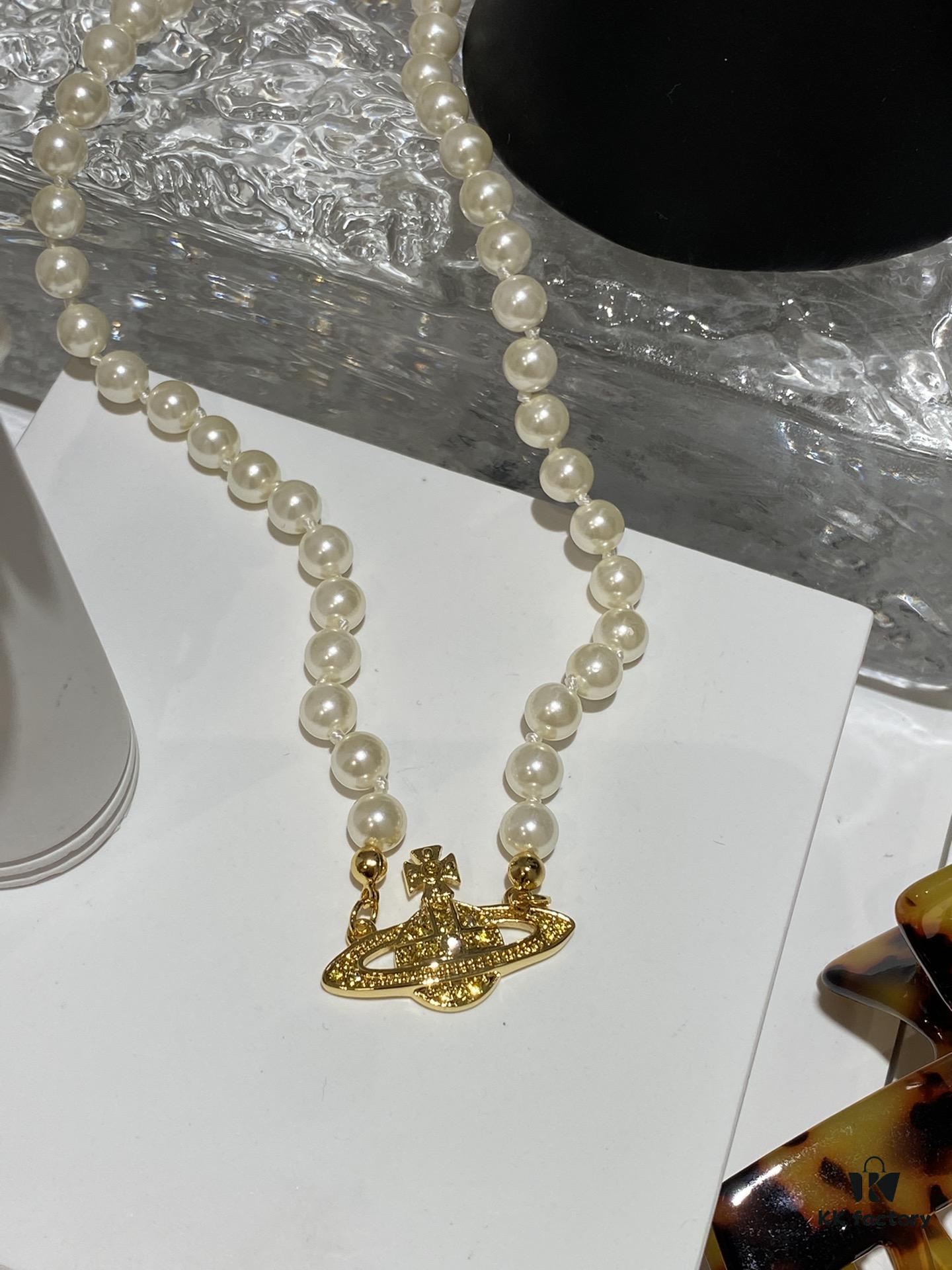 Saturn | Vivienne Westwood Jewelry Pearl Necklace in Gold