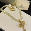 Vivienne Westwood Golden Saturn ORB Pearl Necklace