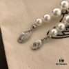 Vivienne Westwood Saturn Pearl Necklace - Medium Size, Rhinestone-Embellished Crown Pendant with Elegant Shine