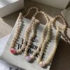 Vivienne Westwood Enamel Pearl Necklace with Magnetic Clasp, Double-Sided Wear, Saturn and Crown Design, Elegant and Edgy Style