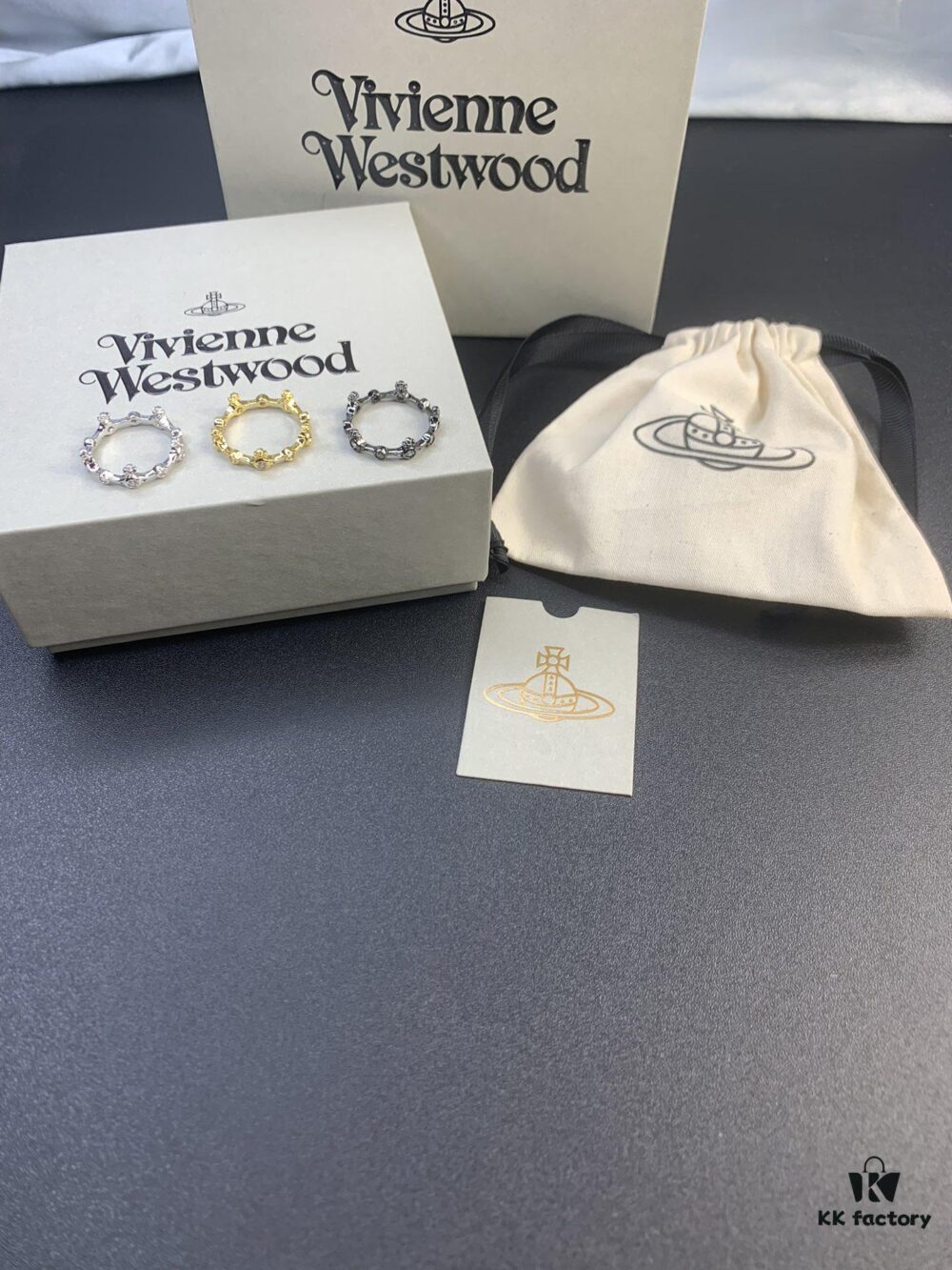 West Dame Bamboo Joint Saturn Ring in Titanium Black, Yellow Gold, and White Gold