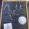 West Queen Skull Skeleton Earrings, Necklace, and Bracelet Set