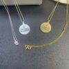 West Grandma Matte Silver and Gold Letter Logo Round Necklace in Two Tones