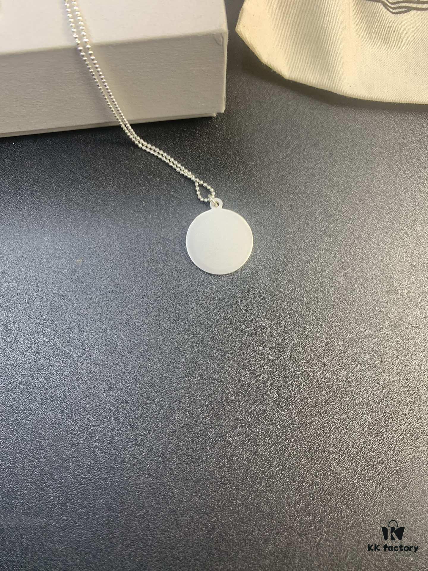 West Grandma Matte Silver and Gold Letter Logo Round Necklace in Two Tones