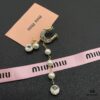 Miu Miu Elegant Heart Pearl Stud Earrings, Minimalist Luxury Design with Vintage Charm