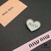Miu Miu Textured Luxury Pearl Heart Brooch, Minimalist Amour Design with Vintage Charm, Must-Have Fashion Accessory for Summer