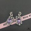 Miu Miu Elegant Heart Pearl Stud Earrings, Minimalist Luxury Design with Vintage Charm