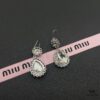 Miu Miu Textured Luxurious Pearl Heart Stud Earrings, Minimalist Design with Vintage Charm