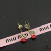 Miu Miu Textured Luxury Pearl Heart Stud Earrings, Minimalist Design with Vintage Charm, Must-Have Summer Fashion Accessory