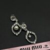 Miumiu Elegant Heart Pearl Stud Earrings, Minimalist Luxury Design with Vintage Charm