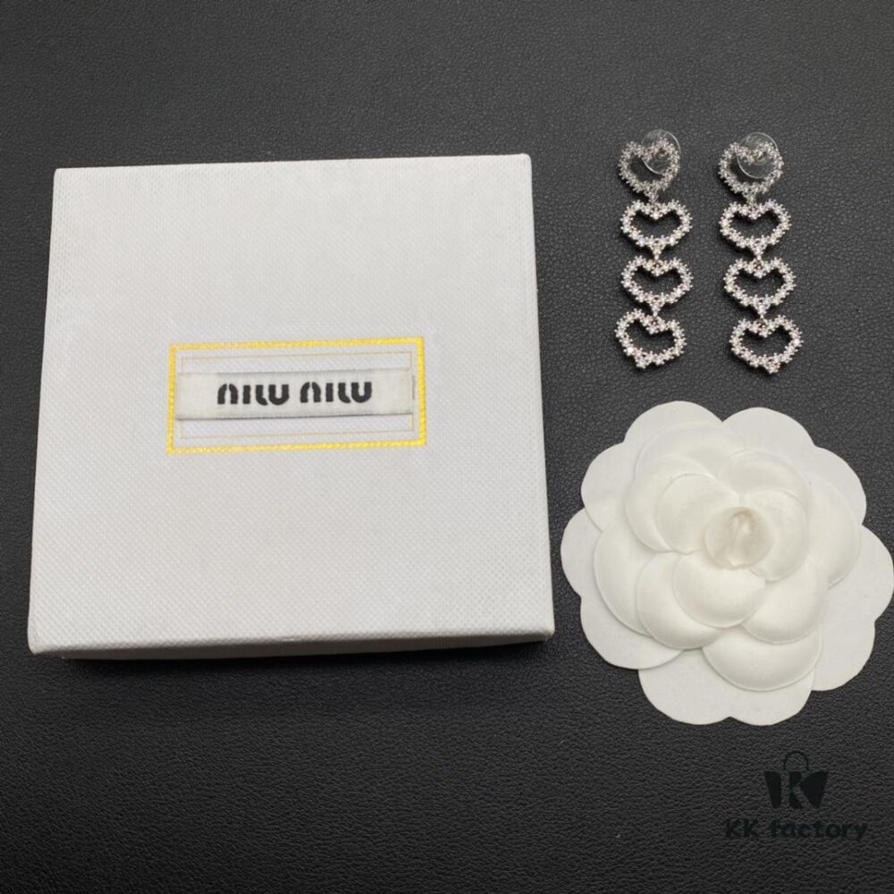 Miu Miu Textured Luxe Minimalist Pearl Heart Stud Earrings