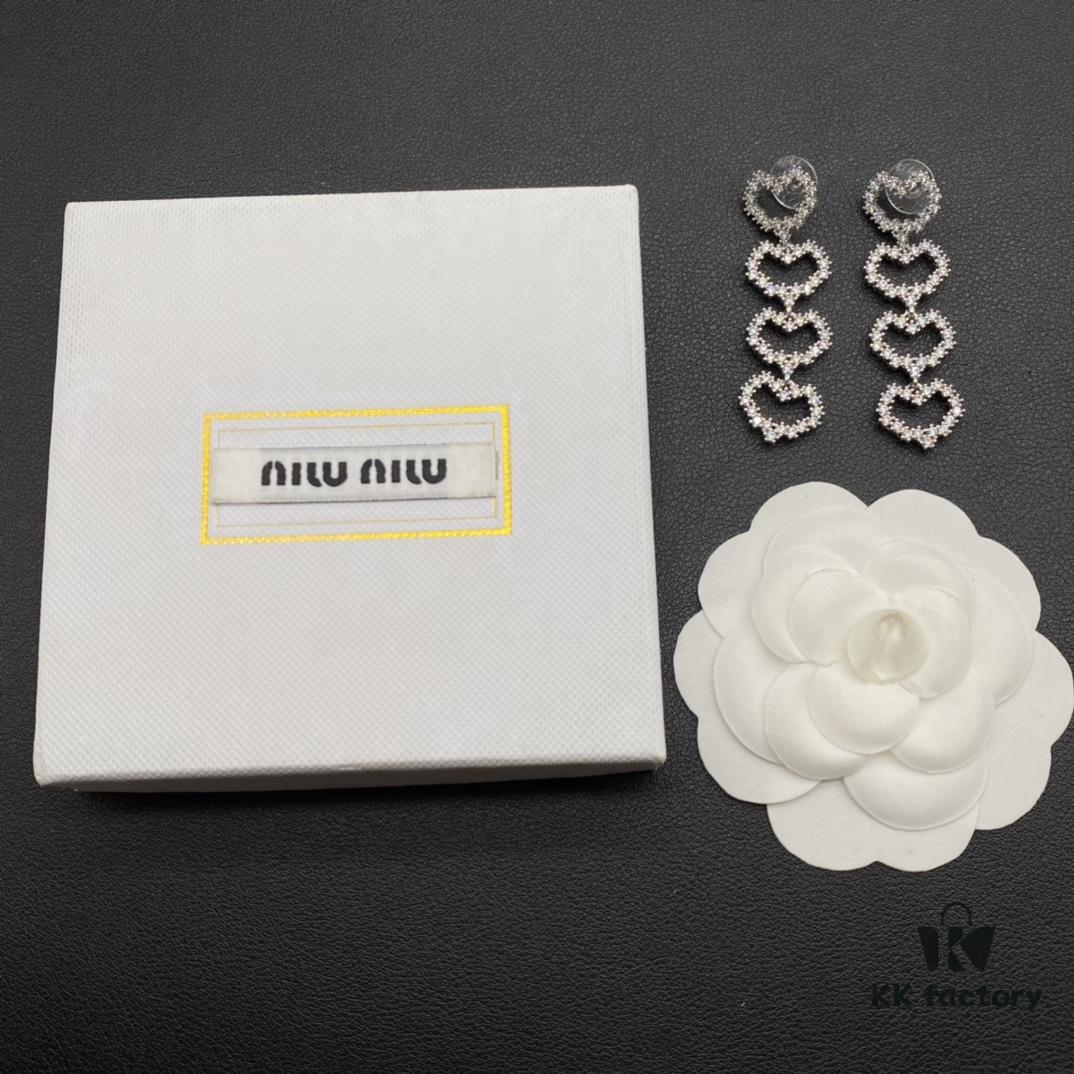 Miu Miu Textured Luxe Minimalist Pearl Heart Stud Earrings