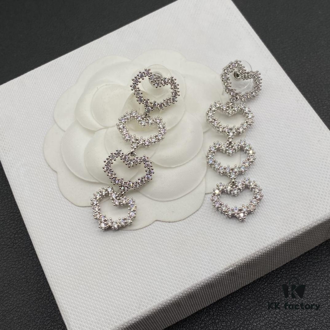 Miu Miu Textured Luxe Minimalist Pearl Heart Stud Earrings