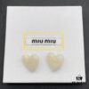 Miu Miu Textured Luxury Pearl Heart Stud Earrings, Minimalist Design with Vintage Charm, Must-Have Summer Fashion Accessory