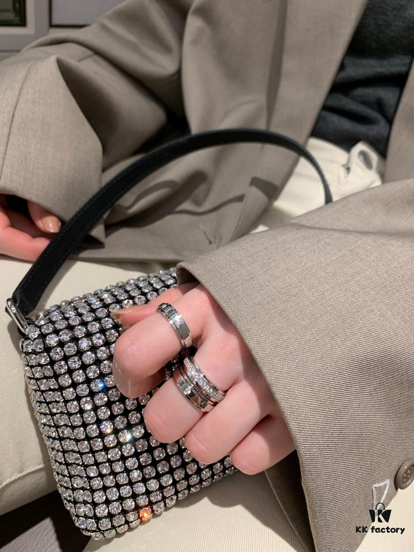 Platinum-colored Piaget ring with rotating design, featuring single diamond, seven-diamond, and full-diamond options