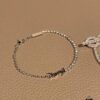 YSL Saint Laurent Half-Paved Bracelet & Hermès Pig Nose Fully Paved Diamond Bracelet