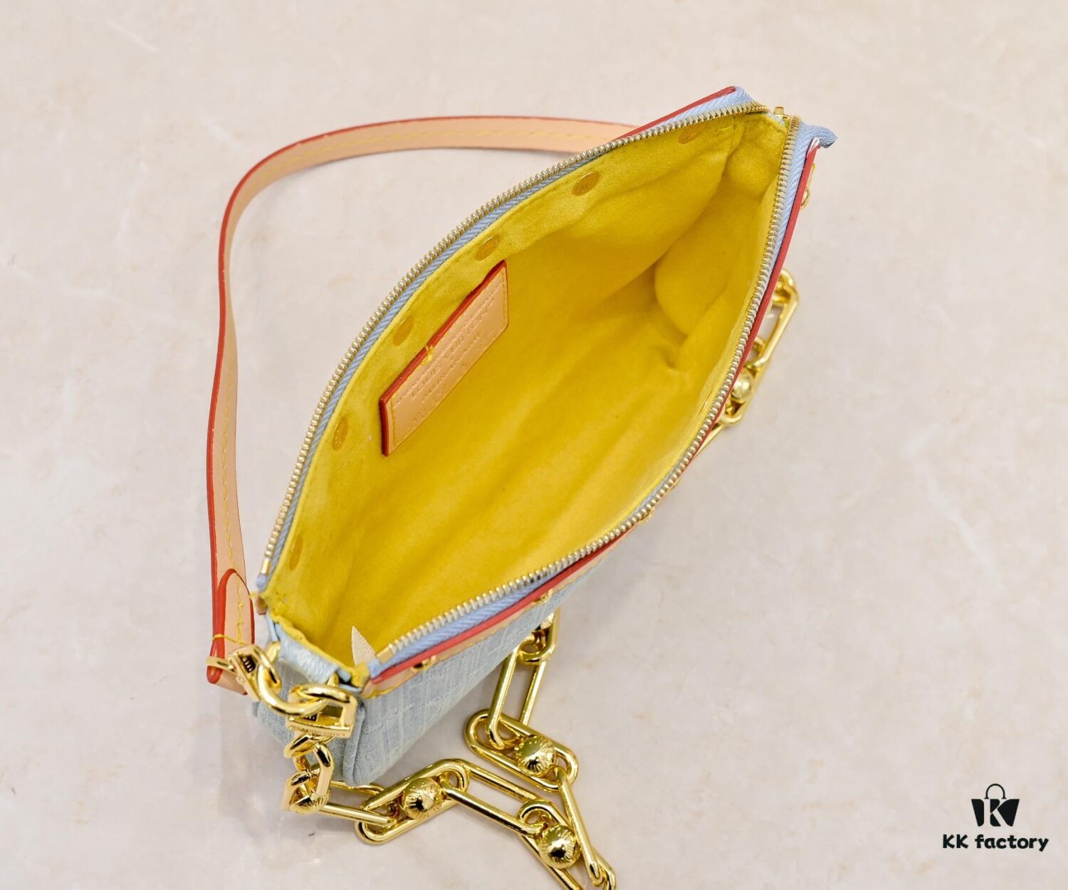 M13404 Denim Coated Canvas Pochette Accessoires Bag with Multicolored Monogram Pattern