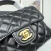 CHANEL 25P New Handle Top Handle Bag Mini in Black and Gold Lambskin