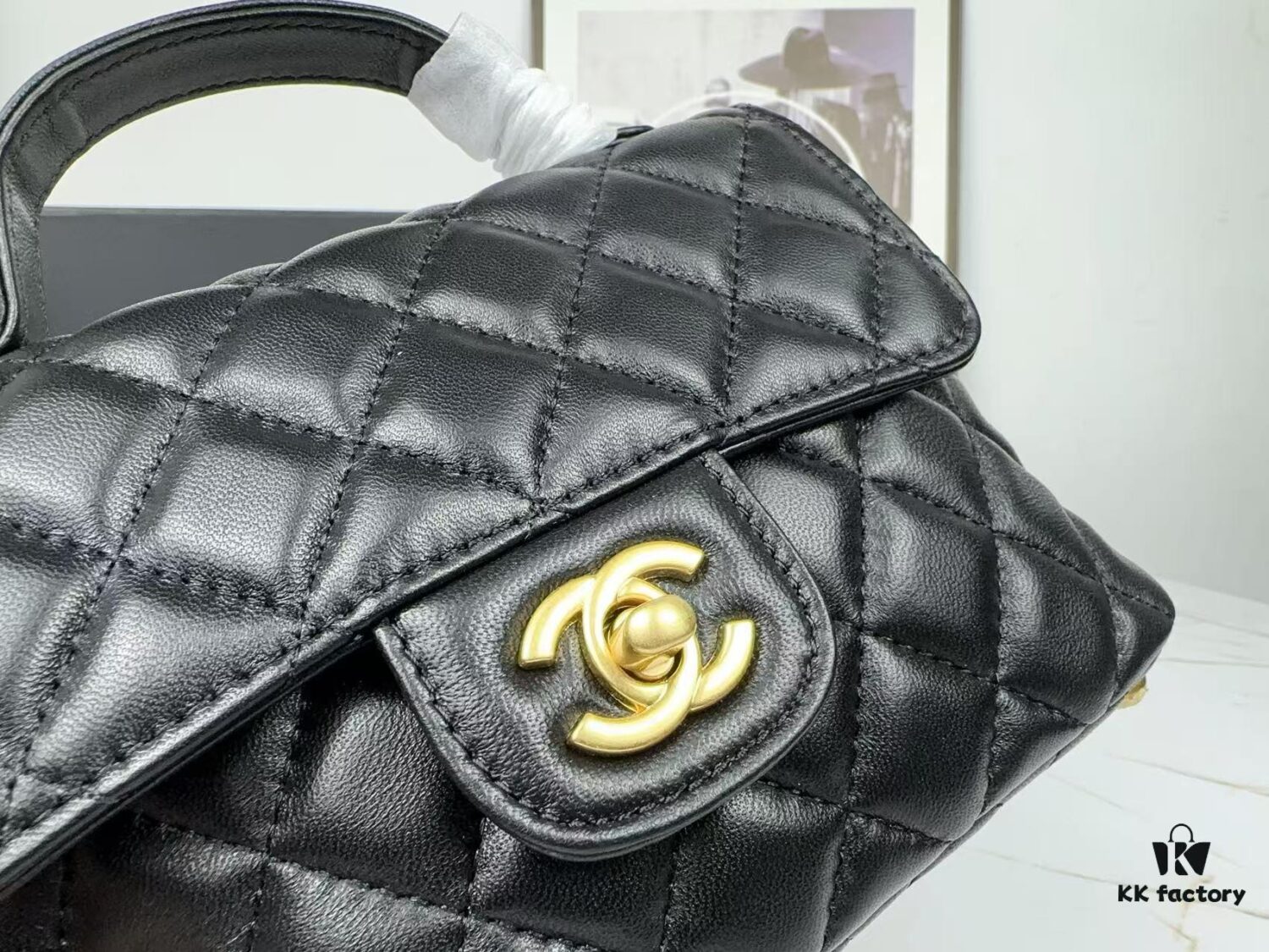 CHANEL 25P New Handle Top Handle Bag Mini in Black and Gold Lambskin