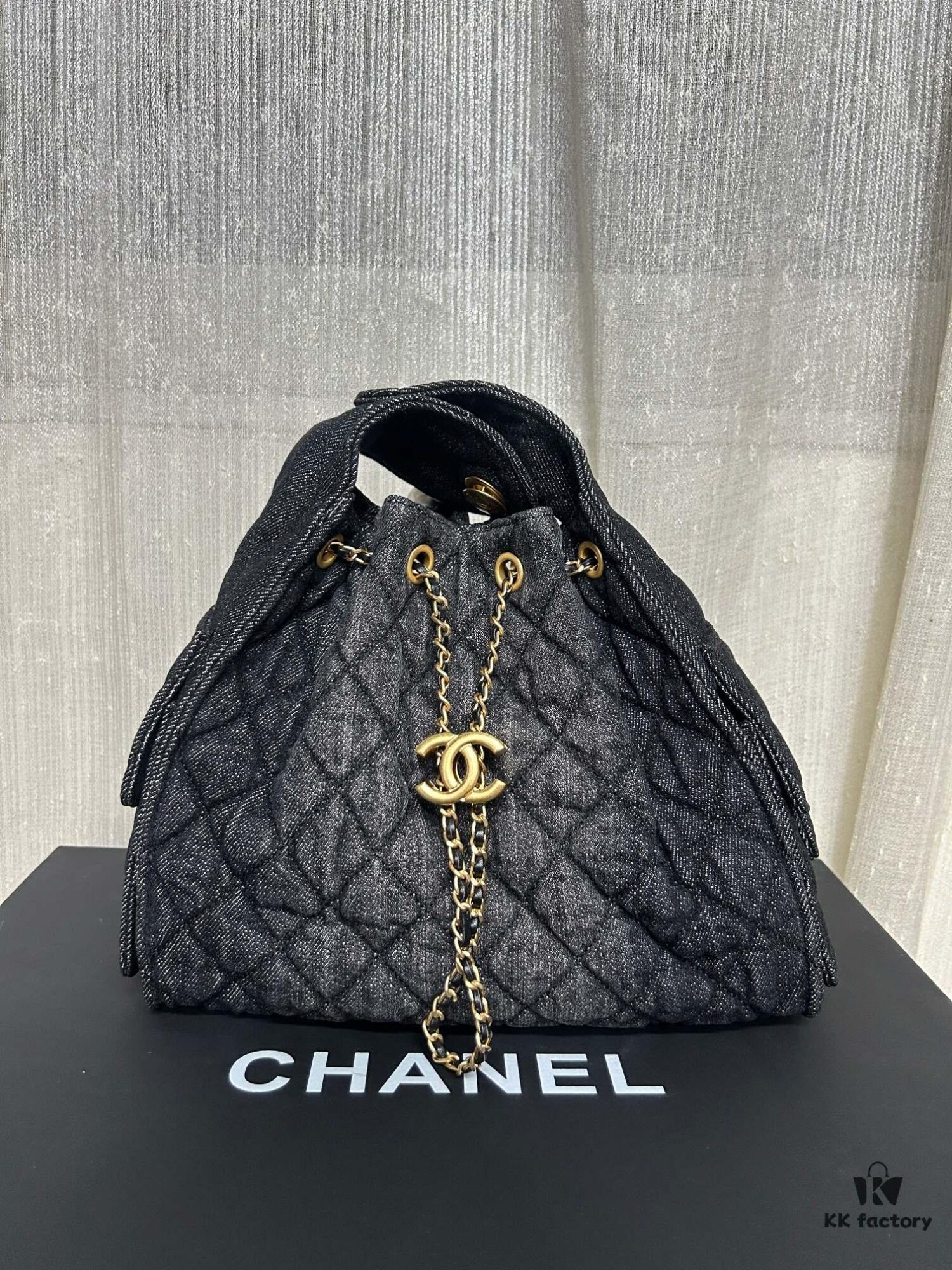 Chanel Washed Denim 25C Hobo Bag with Quilted Ball Texture, Vintage Coin Button Drawstring Bucket Bag in Retro Black and Gold with Diamond Stitching, Classic Chain Design