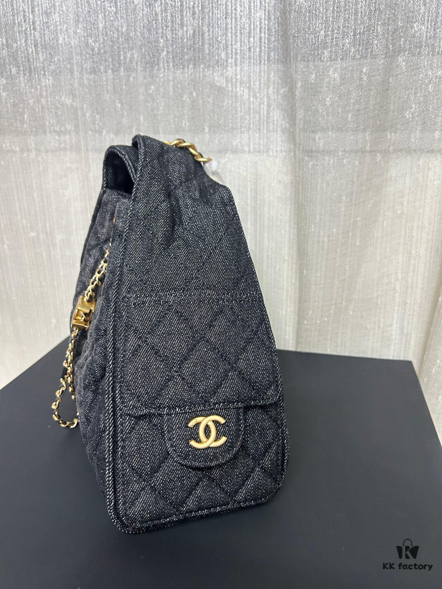 Chanel Washed Denim 25C Hobo Bag with Quilted Ball Texture, Vintage Coin Button Drawstring Bucket Bag in Retro Black and Gold with Diamond Stitching, Classic Chain Design