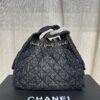 Chanel Washed Denim 25C Hobo Bag with Quilted Ball Texture, Vintage Coin Button Drawstring Bucket Bag in Retro Black and Gold with Diamond Stitching, Classic Chain Design