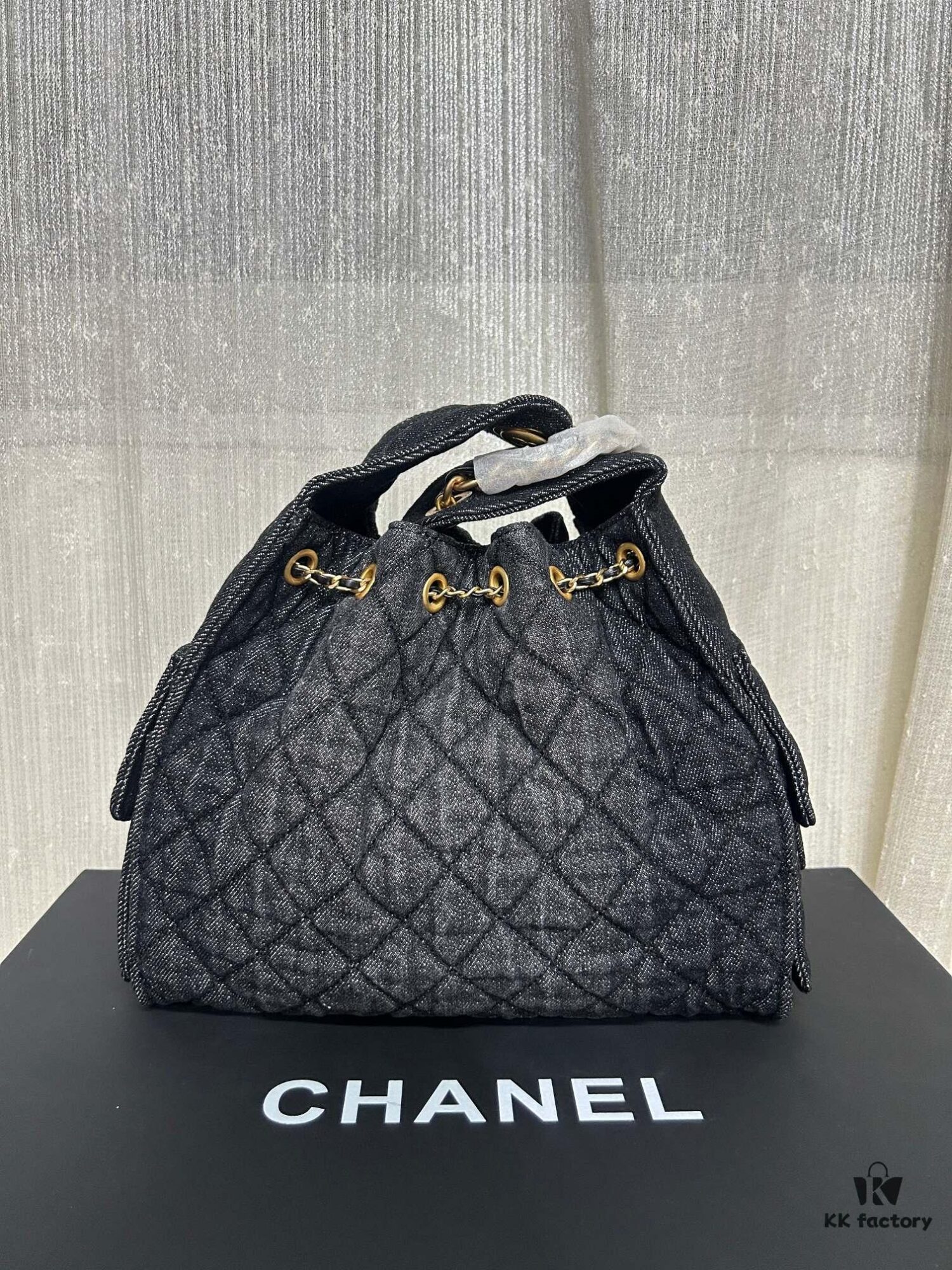 Chanel Washed Denim 25C Hobo Bag with Quilted Ball Texture, Vintage Coin Button Drawstring Bucket Bag in Retro Black and Gold with Diamond Stitching, Classic Chain Design