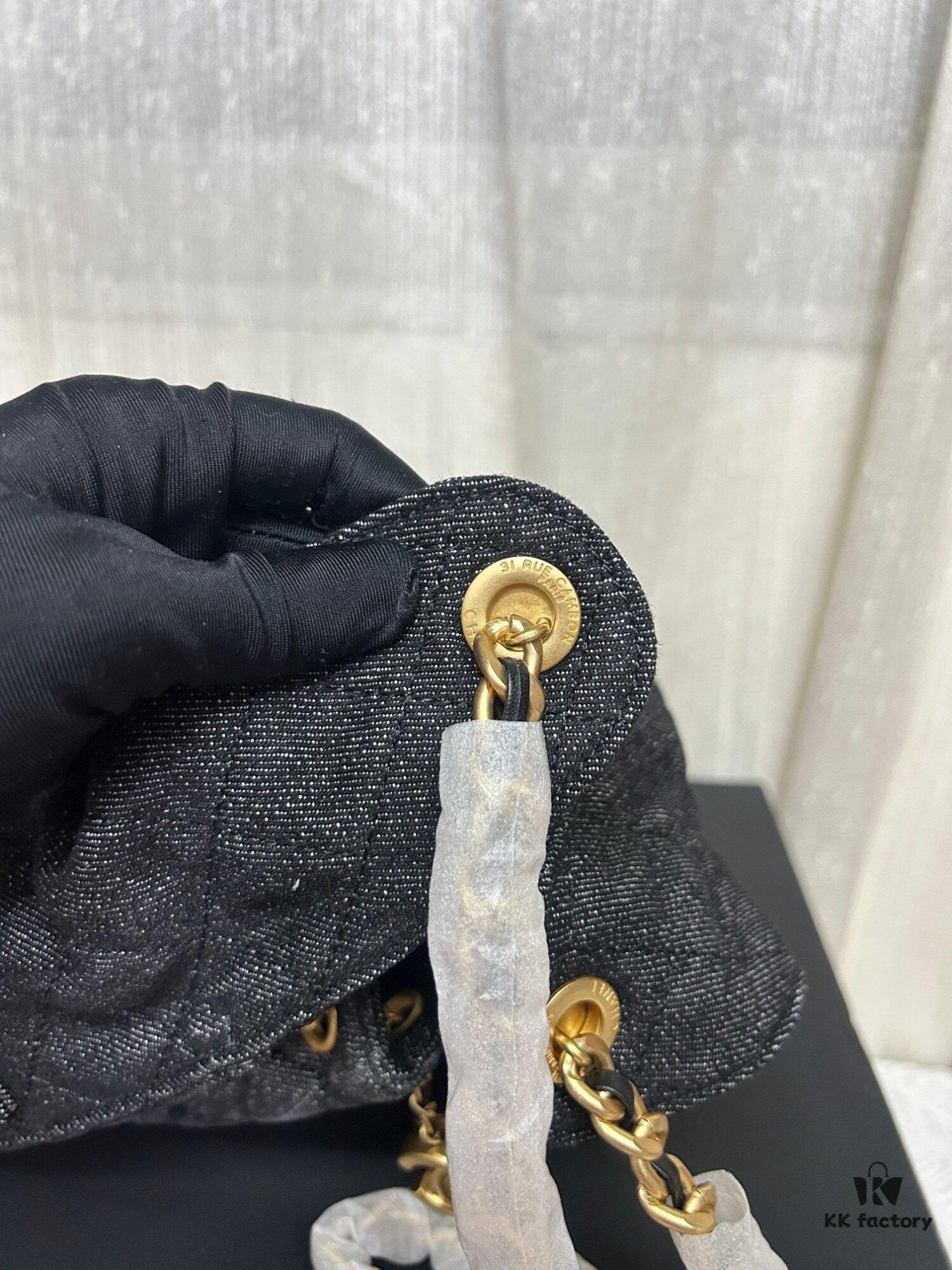 Chanel Washed Denim 25C Hobo Bag with Quilted Ball Texture, Vintage Coin Button Drawstring Bucket Bag in Retro Black and Gold with Diamond Stitching, Classic Chain Design