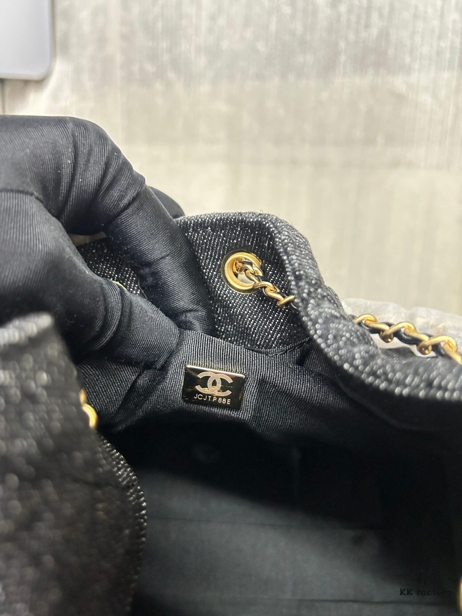 Chanel Washed Denim 25C Hobo Bag with Quilted Ball Texture, Vintage Coin Button Drawstring Bucket Bag in Retro Black and Gold with Diamond Stitching, Classic Chain Design