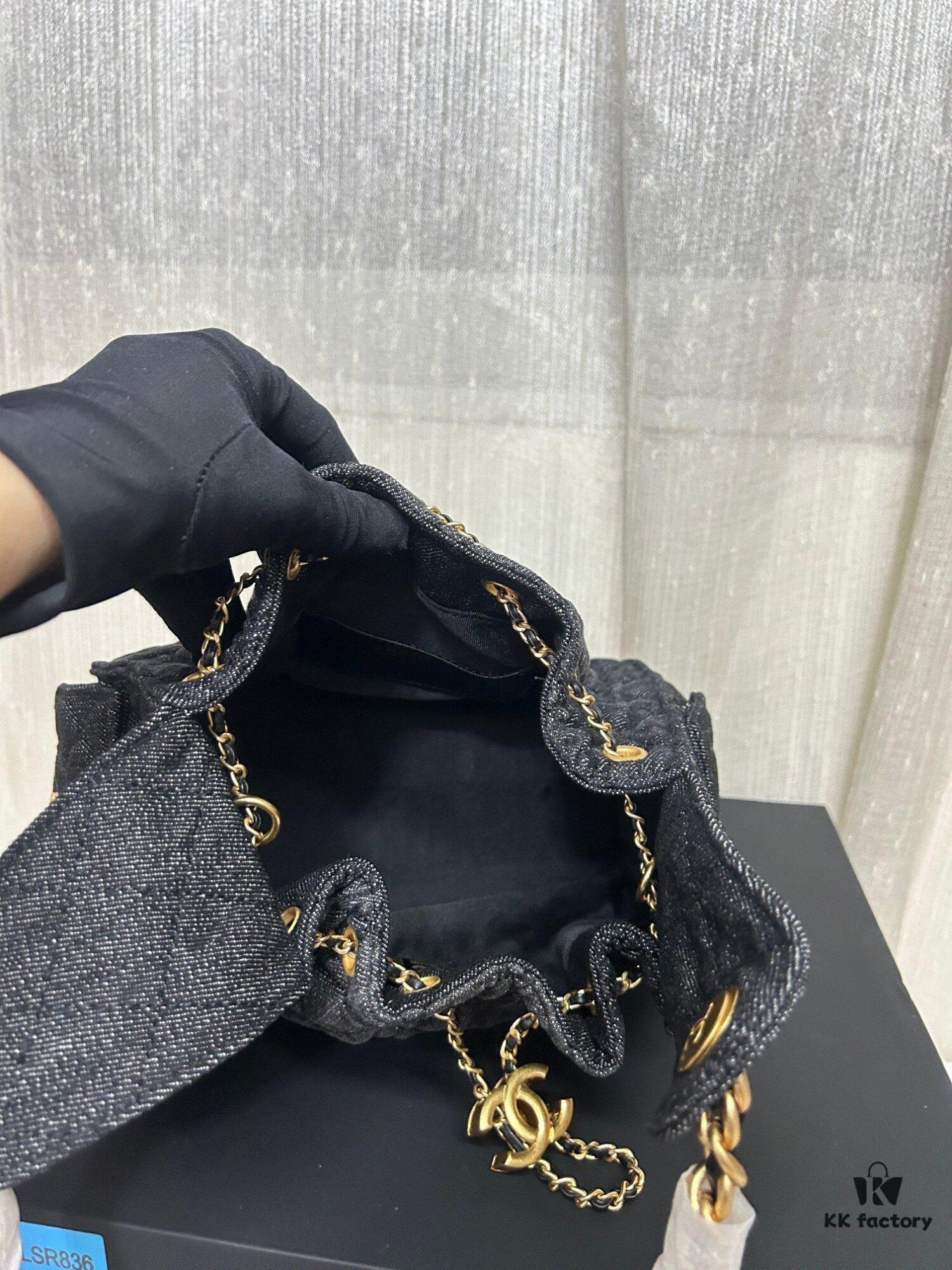 Chanel Washed Denim 25C Hobo Bag with Quilted Ball Texture, Vintage Coin Button Drawstring Bucket Bag in Retro Black and Gold with Diamond Stitching, Classic Chain Design