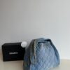 Chanel Washed Denim 25C Hobo Bag with Quilted Ball Texture, Vintage Coin Buckle Drawstring Bucket Bag in Retro Black and Gold with Diamond Stitching and Classic Chain Design