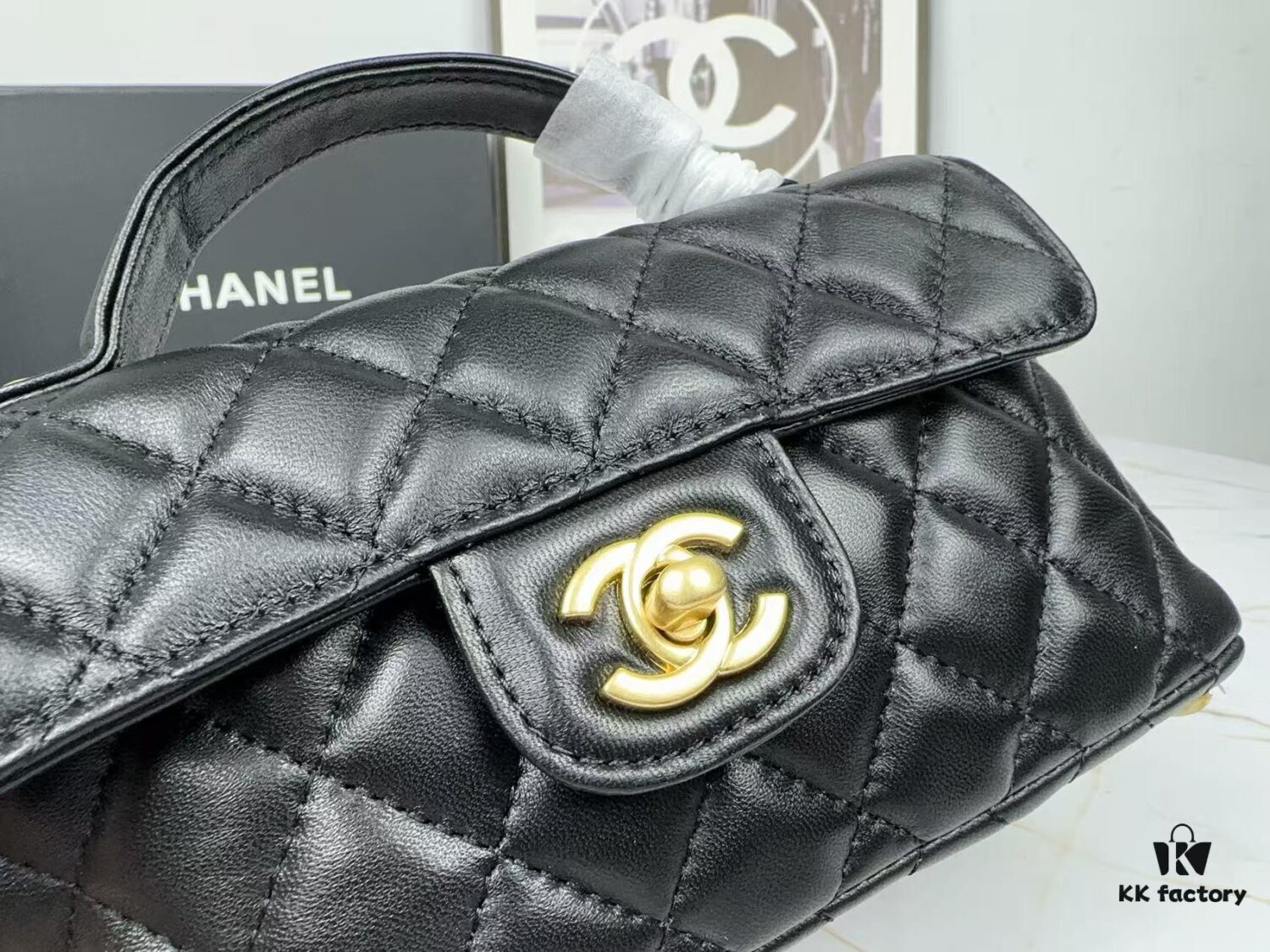 CHANEL 25P New Handle Top Handle Bag Mini in Black and Gold Lambskin