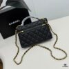 CHANEL 25P Black and Gold Brushed Logo Flat Box Bag in Top-Grain Caviar Leather