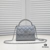 Small Chanel Kelly Bag in Black Lamb Leather with Long Handle