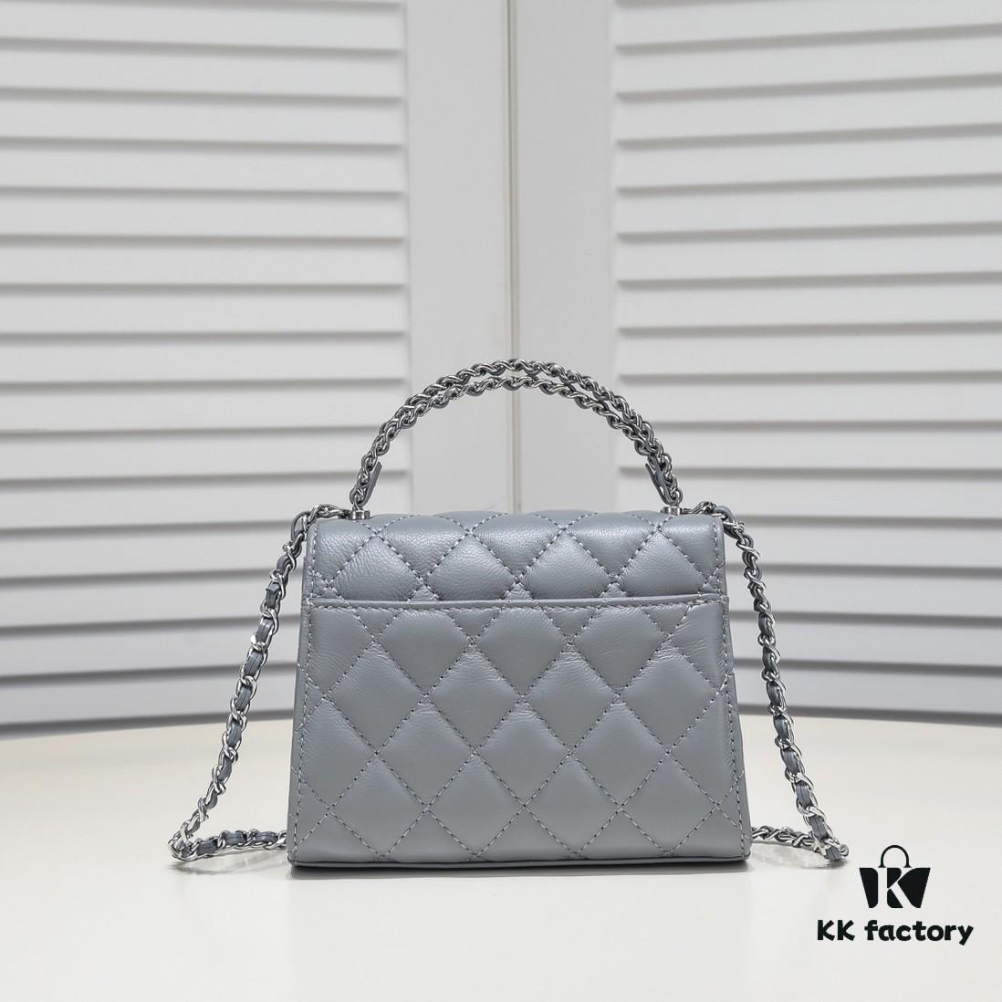 Small Chanel Kelly Bag in Black Lamb Leather with Long Handle